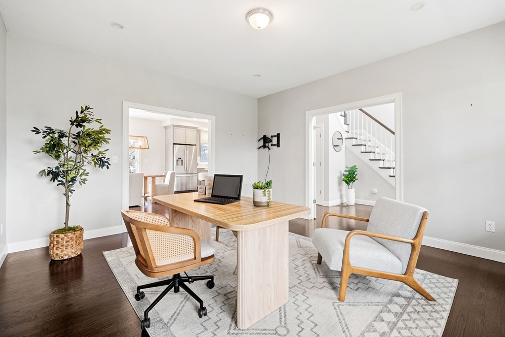 45 Saddleback Lane Canton, MA 02021 - Photo 11 of 42 a workspace with furniture and a potted plant