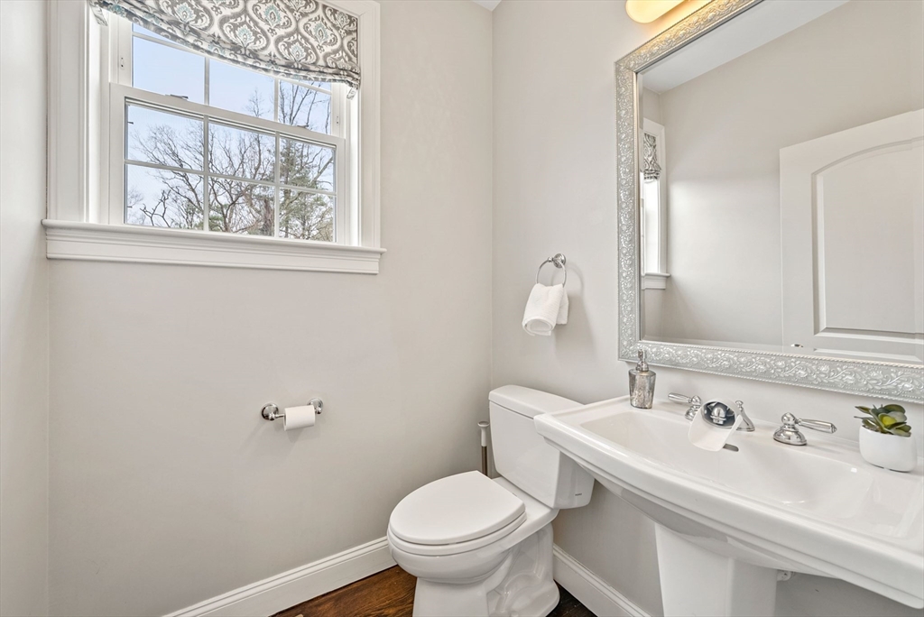 45 Saddleback Lane Canton, MA 02021 - Photo 14 of 42 a bathroom with a sink and a toilet