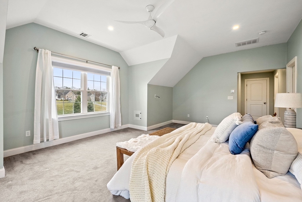45 Saddleback Lane Canton, MA 02021 - Photo 18 of 42 a bedroom with a large bed and a large window