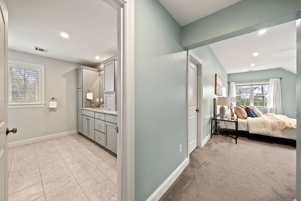 45 Saddleback Lane Canton, MA 02021 - Photo 19 of 42 a bedroom with furniture and large window