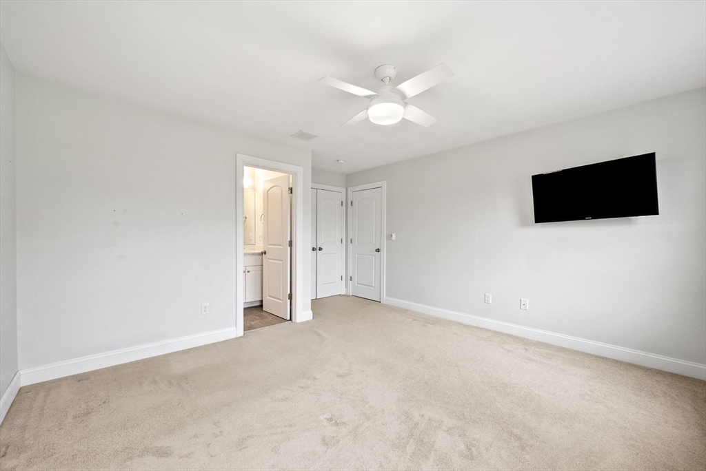 45 Saddleback Lane Canton, MA 02021 - Photo 21 of 42 a view of a livingroom with a flat screen tv