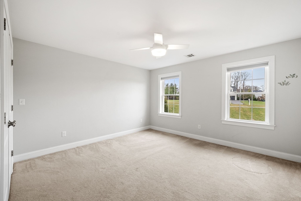 45 Saddleback Lane Canton, MA 02021 - Photo 24 of 42 an empty room with a window