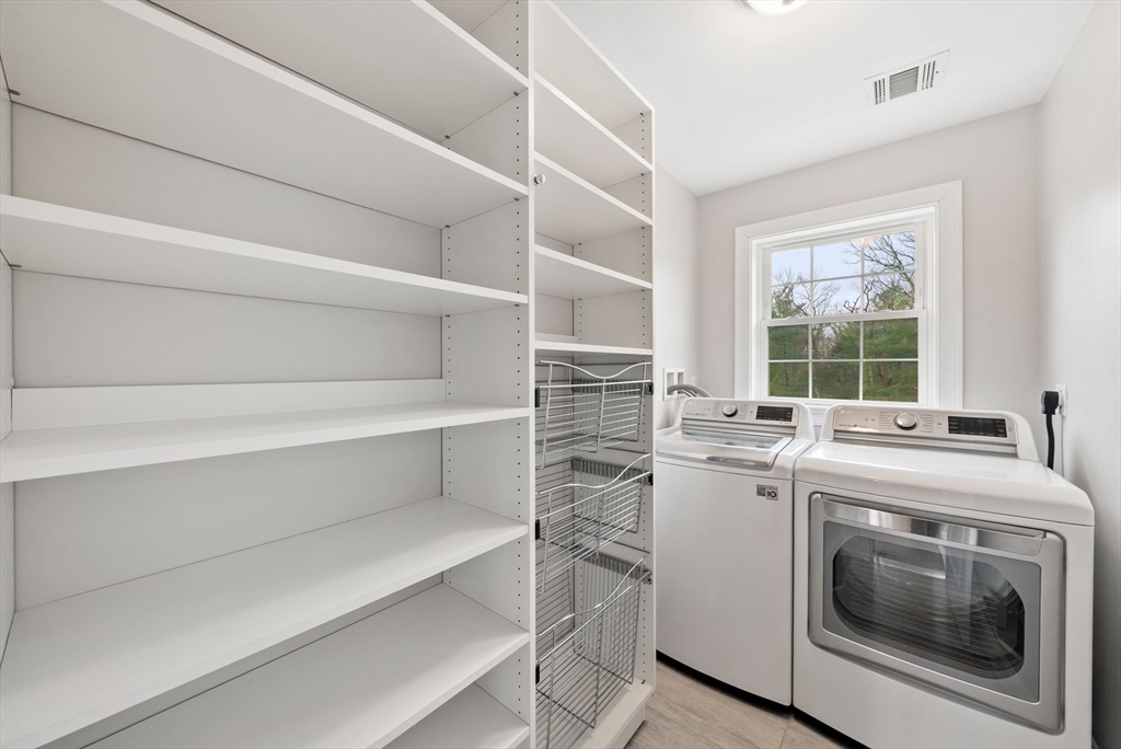45 Saddleback Lane Canton, MA 02021 - Photo 26 of 42 a view of washer and dryer in a room