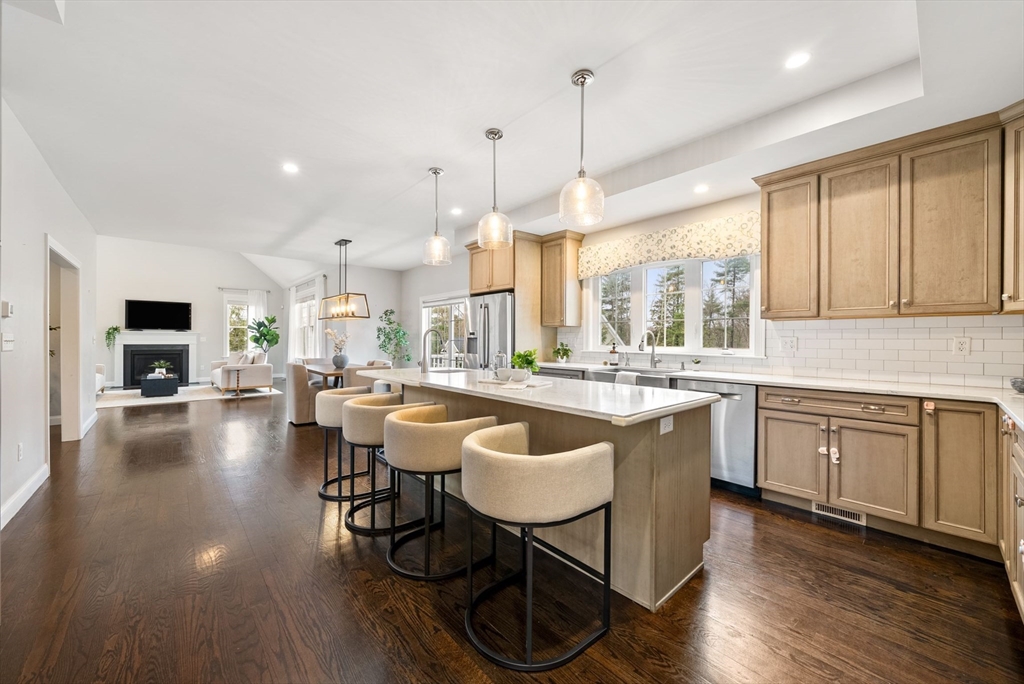 45 Saddleback Lane Canton, MA 02021 - Photo 5 of 42 a large kitchen with a table and chairs
