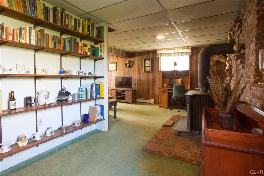 222 Cherry Hill Road Nazareth, PA 18064 - Photo 16 of 31 a view of a living room with clothes and shoes