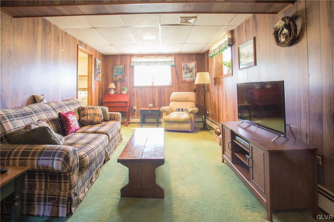 222 Cherry Hill Road Nazareth, PA 18064 - Photo 17 of 31 a living room with furniture and a flat screen tv