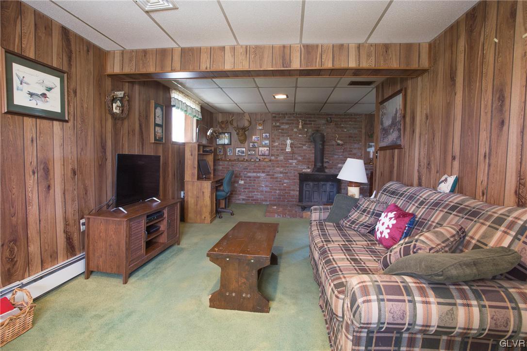 222 Cherry Hill Road Nazareth, PA 18064 - Photo 18 of 31 a living room with furniture and a flat screen tv