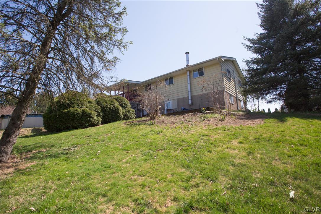 222 Cherry Hill Road Nazareth, PA 18064 - Photo 29 of 31 a view of a house with a big yard and large trees