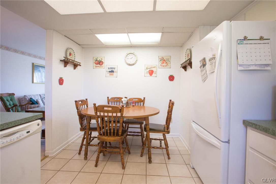 222 Cherry Hill Road Nazareth, PA 18064 - Photo 5 of 31 a dining room with furniture and refrigerator