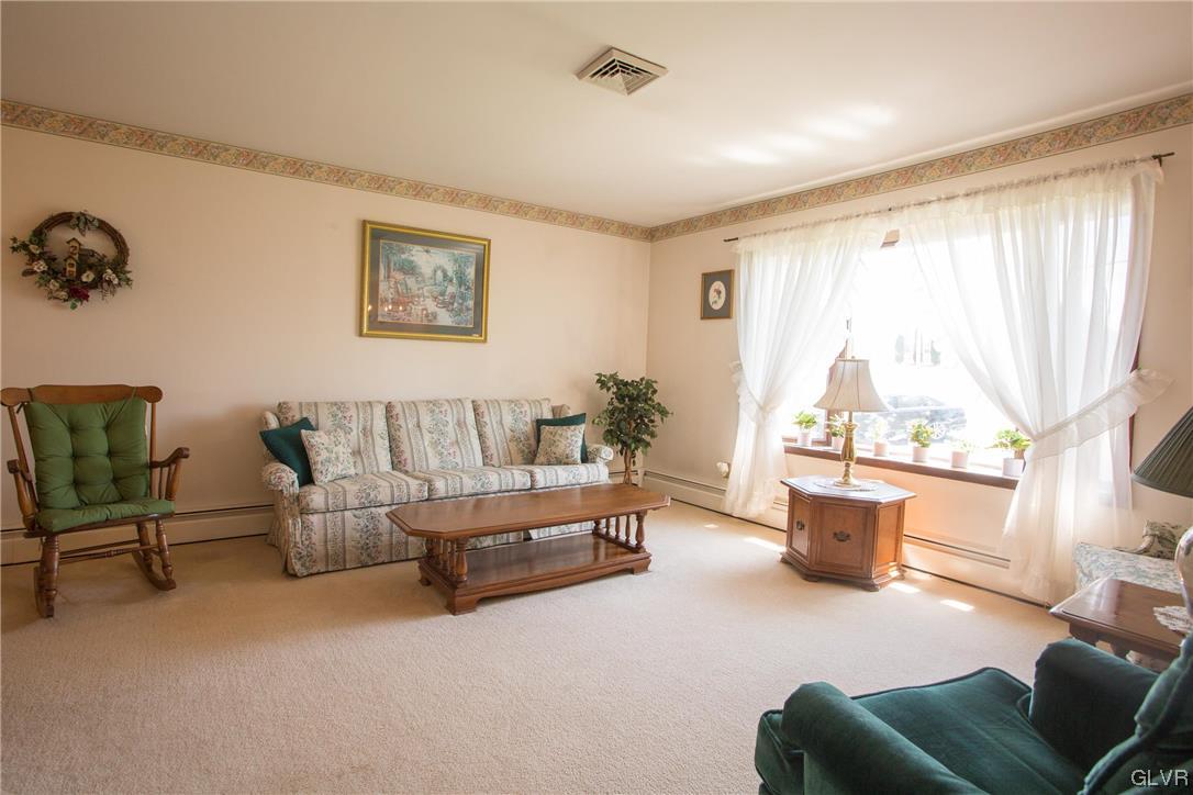 222 Cherry Hill Road Nazareth, PA 18064 - Photo 6 of 31 a living room with furniture and a large window