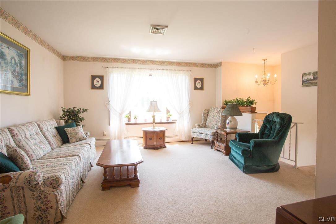 222 Cherry Hill Road Nazareth, PA 18064 - Photo 7 of 31 a living room with furniture and a large window