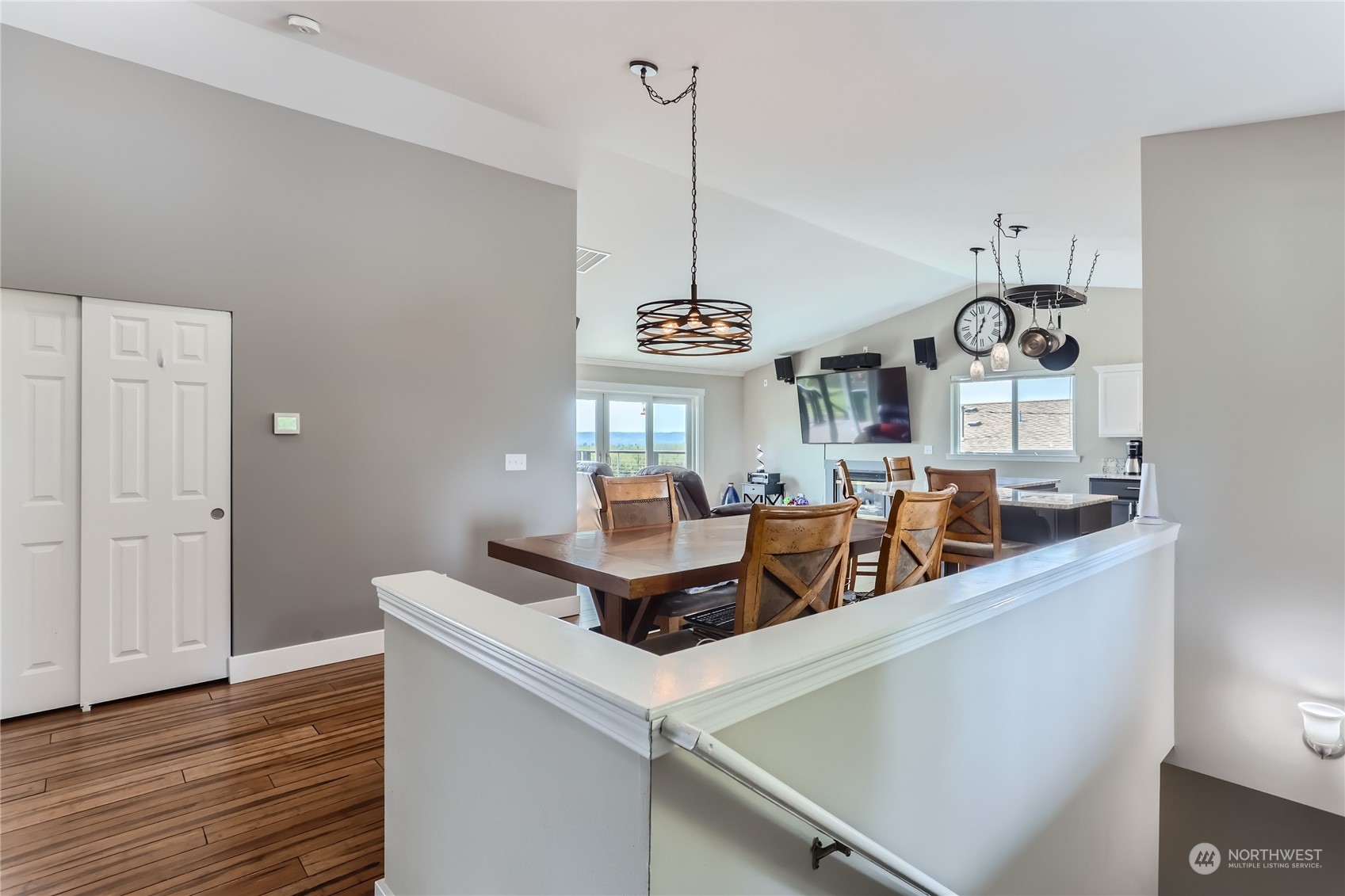 21712 Calhoun Road Monroe, WA 98272 - Photo 4 of 37 a view of a dining room with furniture and wooden floor
