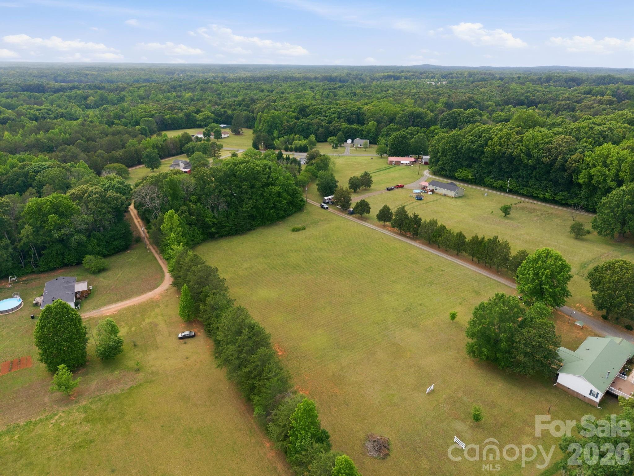 Tbd Sisk-Carter Road Rockwell, NC 28138 - Photo 5 of 14 an aerial view of a residential houses with outdoor space and trees all around