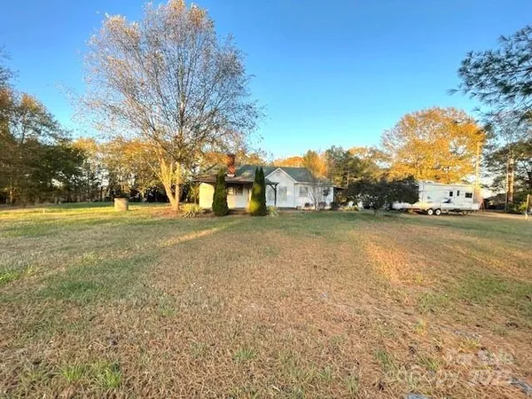 a view of outdoor space and yard