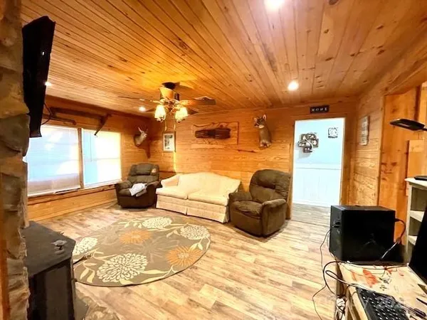 a bedroom with a bed and a mirror