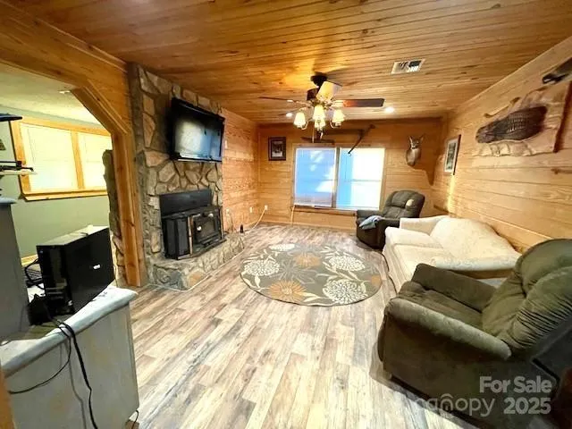 a view of a porch with furniture and yard