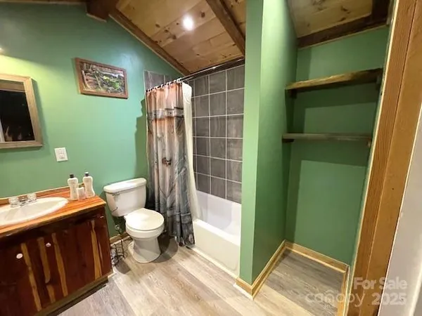 a view of furniture and wooden floor