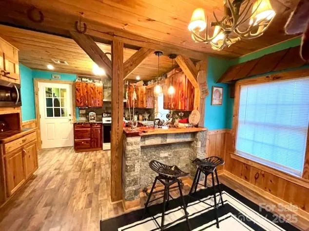 a view of a livingroom with furniture and a fireplace