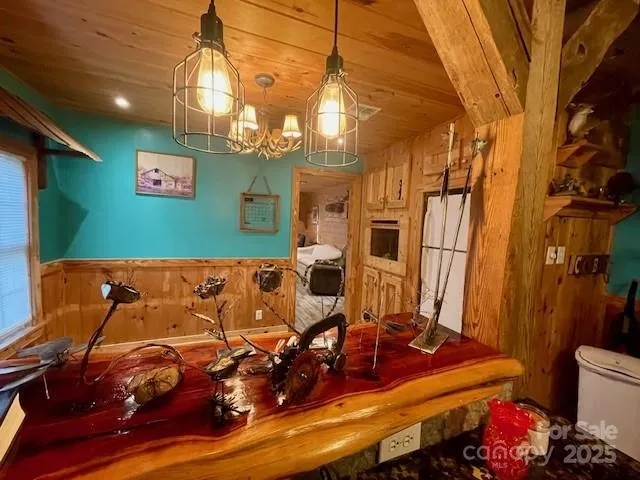 a bedroom with a bed and a ceiling fan