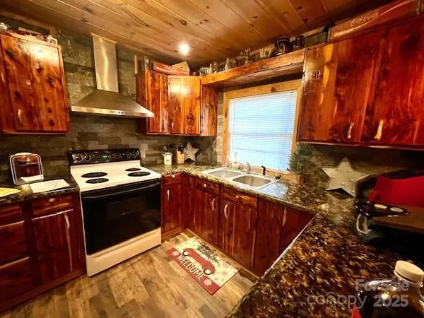 a bedroom with a bed and a television