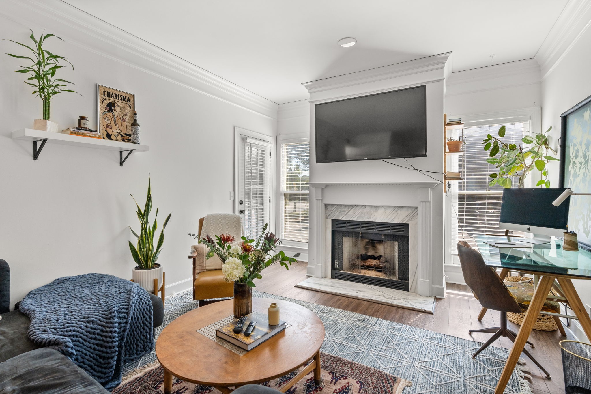 414 Sloan Road Nashville, TN 37209 - Photo 1 of 16 a living room with furniture fireplace and a flat screen tv