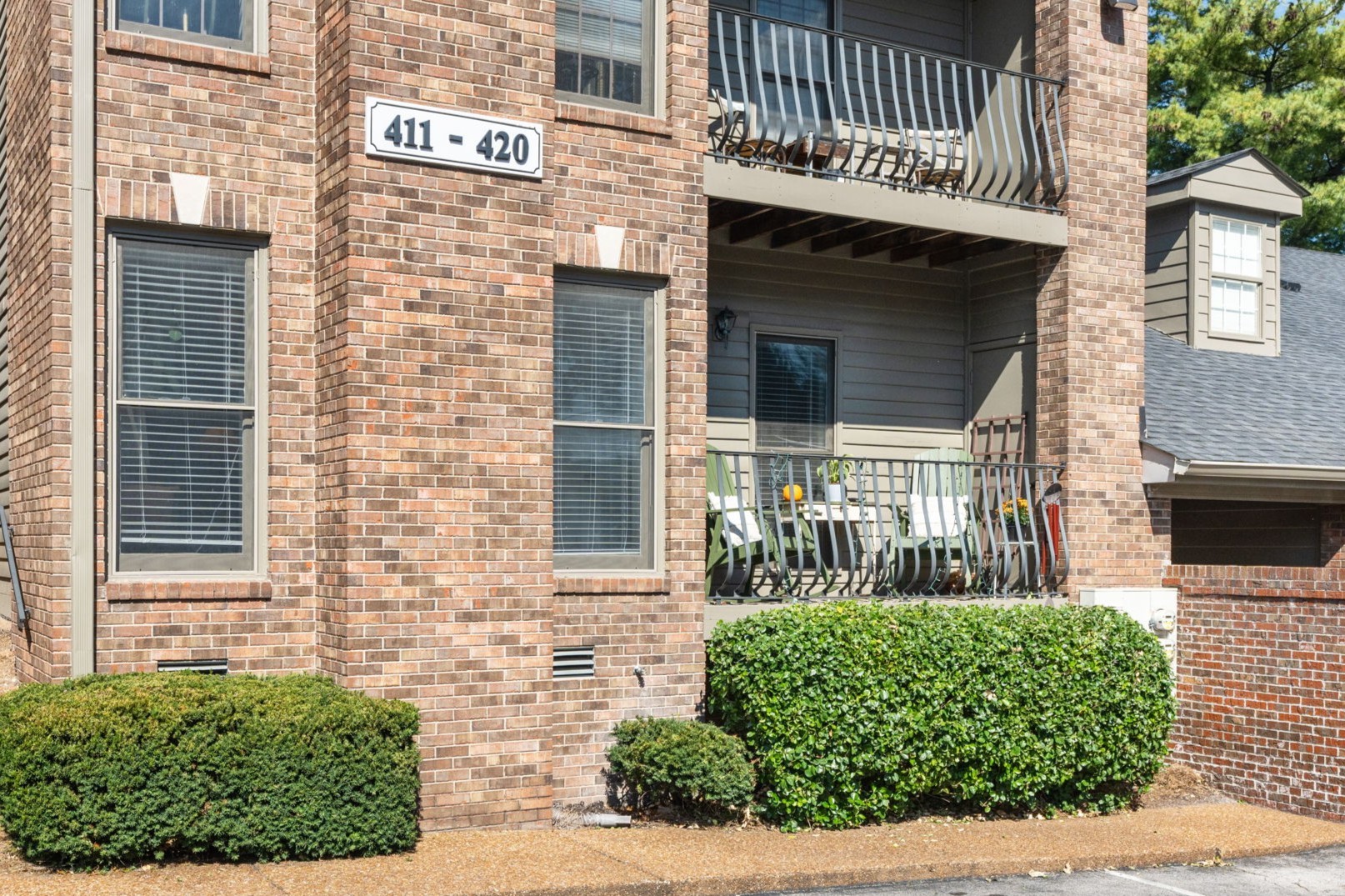 414 Sloan Road Nashville, TN 37209 - Photo 2 of 16 a front view of a house with a garden