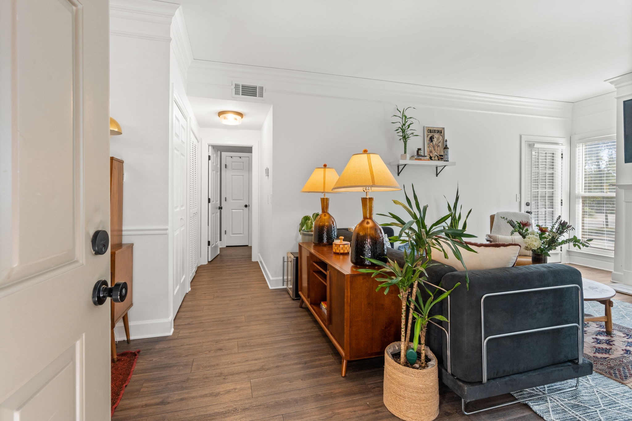 414 Sloan Road Nashville, TN 37209 - Photo 4 of 16 a living room with furniture and a chandelier
