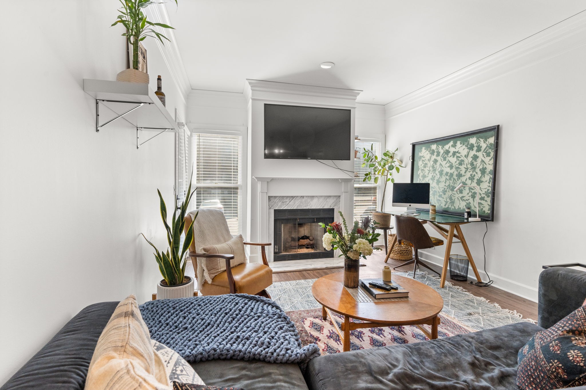 414 Sloan Road Nashville, TN 37209 - Photo 5 of 16 a living room with furniture fireplace and flat screen tv