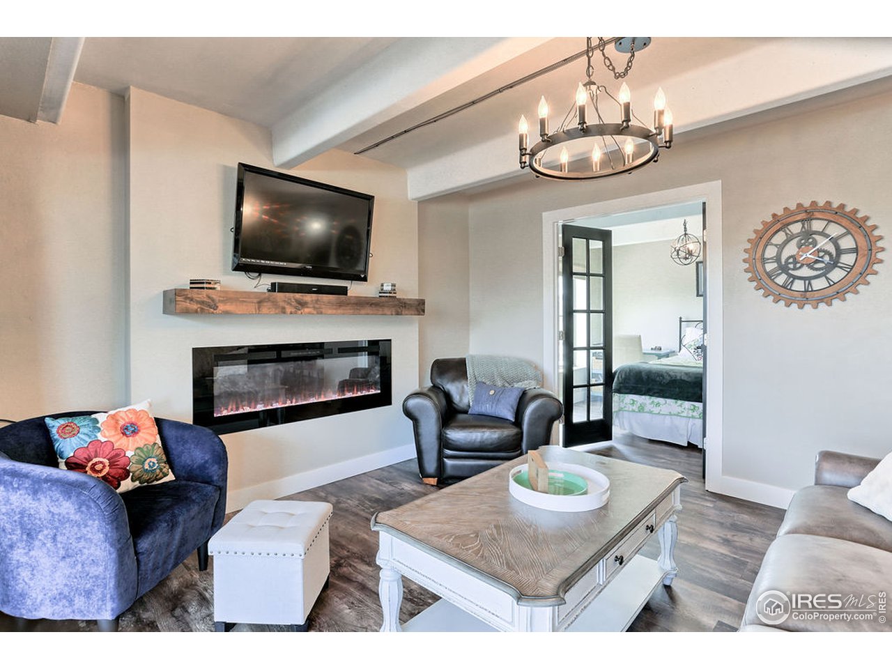 415 South Howes Street, Unit 209 Fort Collins, CO 80521 - Photo 21 of 37 Living room with french doors to 2nd bedroom