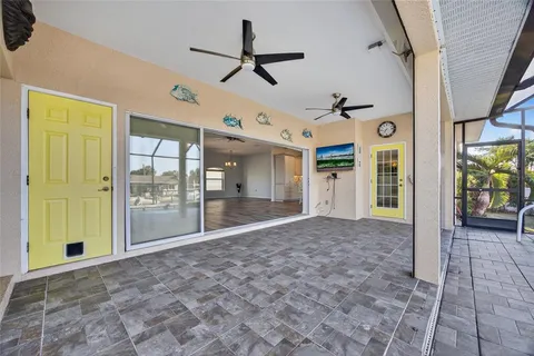 a view of a swimming pool with a patio