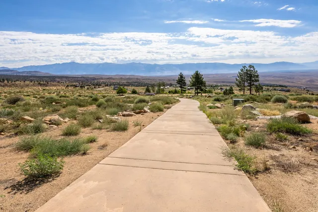 a view of ocean with a mountain