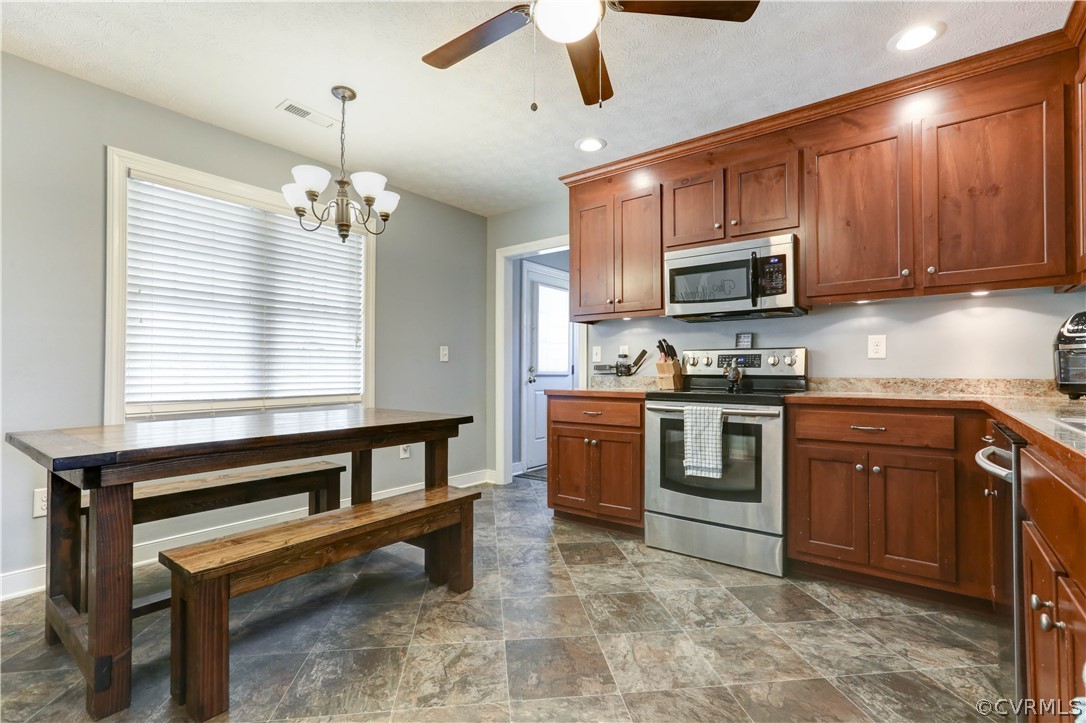 384 Landing Road Manquin, VA 23106 - Photo 11 of 47 Eat-In Kitchen with plenty of natural light, leads