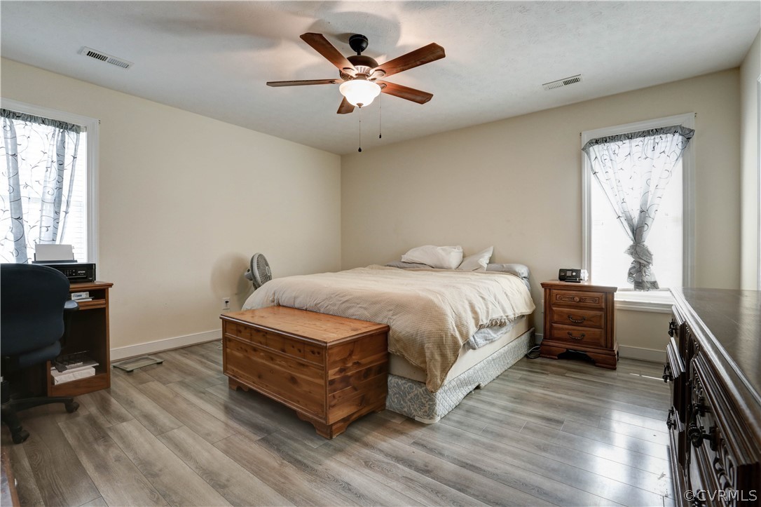 384 Landing Road Manquin, VA 23106 - Photo 23 of 47 Primary Bedroom has Ceiling Fan and LVT Flooring a