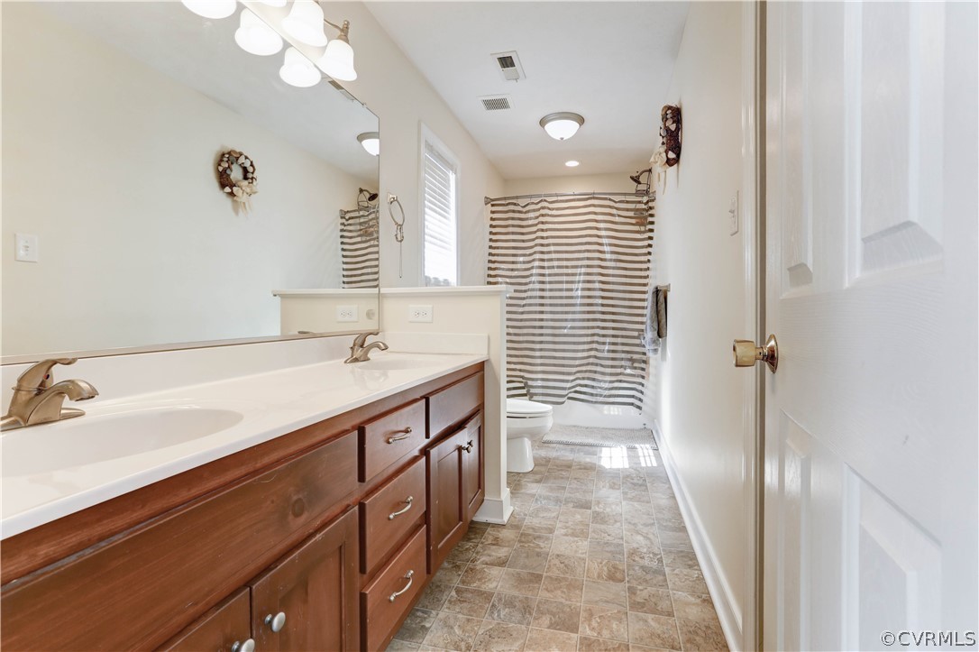 384 Landing Road Manquin, VA 23106 - Photo 25 of 47 Primary Bath with double vanities and tub/shower c