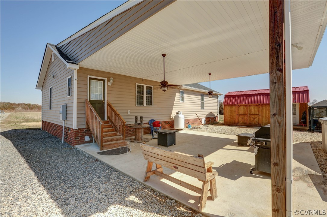 Relax on this shaded Covered Patio, grill up your