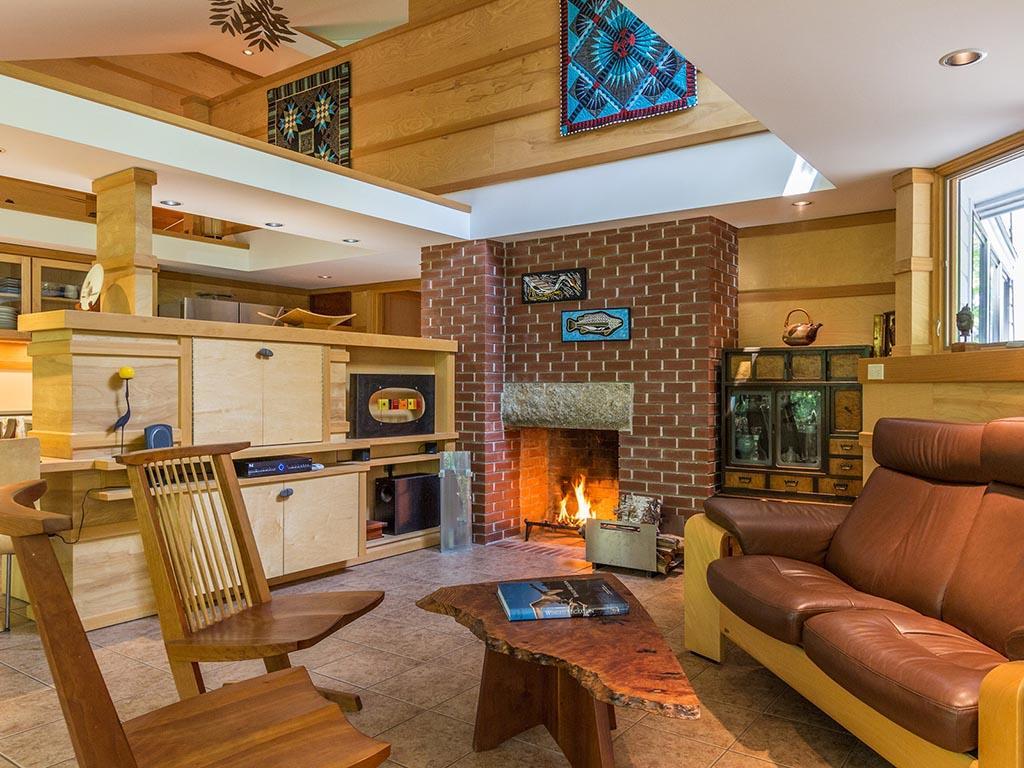 22 Mount Hunger Road East Edgecomb, ME 04556 - Photo 5 of 34 Living room has a fireplace and...