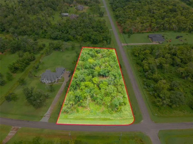 a view of a garden with a lake view