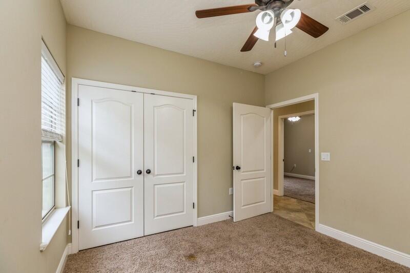 4609 Hermosa Road Crestview, FL 32539 - Photo 20 of 34 wooden floor in an empty room