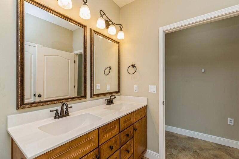 4609 Hermosa Road Crestview, FL 32539 - Photo 22 of 34 a bathroom with a sink and a mirror