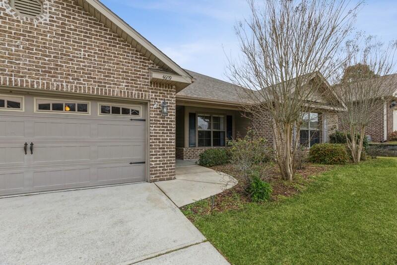 4609 Hermosa Road Crestview, FL 32539 - Photo 3 of 34 a view of a house with a yard