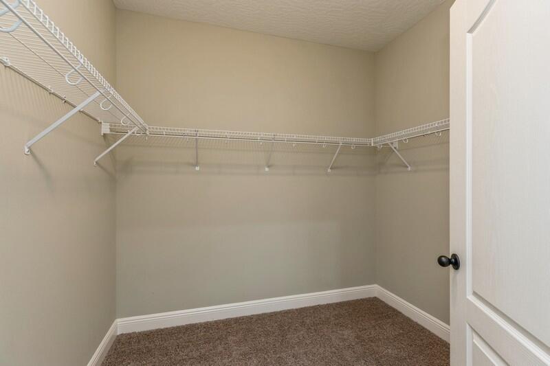 4609 Hermosa Road Crestview, FL 32539 - Photo 32 of 34 a view of a room with racks on the wall