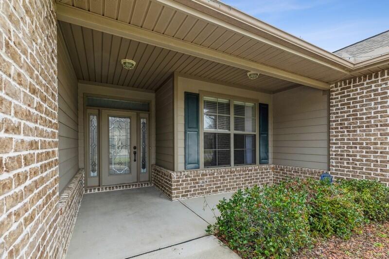4609 Hermosa Road Crestview, FL 32539 - Photo 4 of 34 a front view of a house with a large window