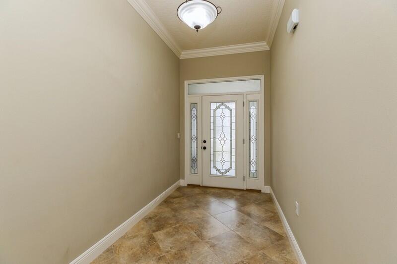 4609 Hermosa Road Crestview, FL 32539 - Photo 5 of 34 a view of an empty room with a window