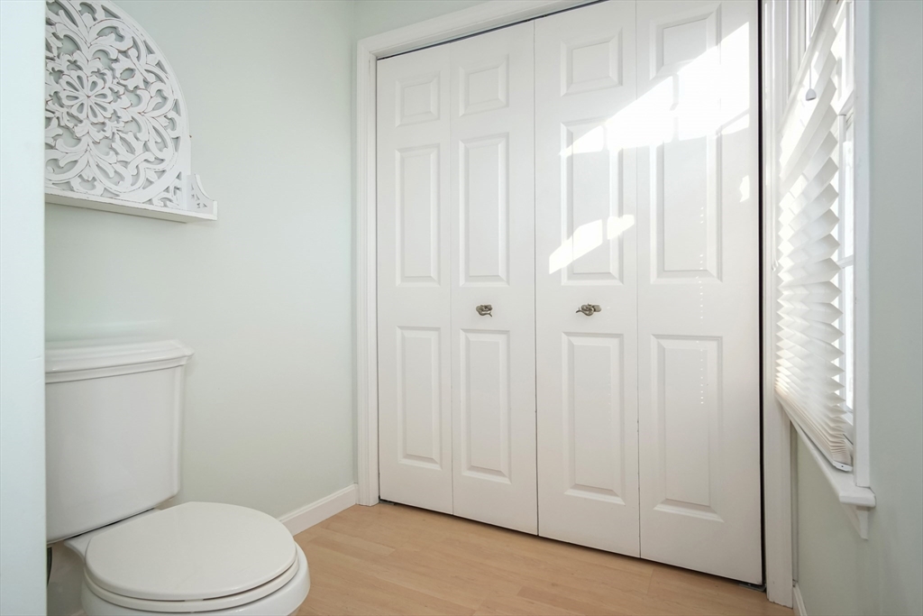 77 Circuit Avenue Wareham, MA 02571 - Photo 27 of 39 a white toilet sitting next to a bathroom