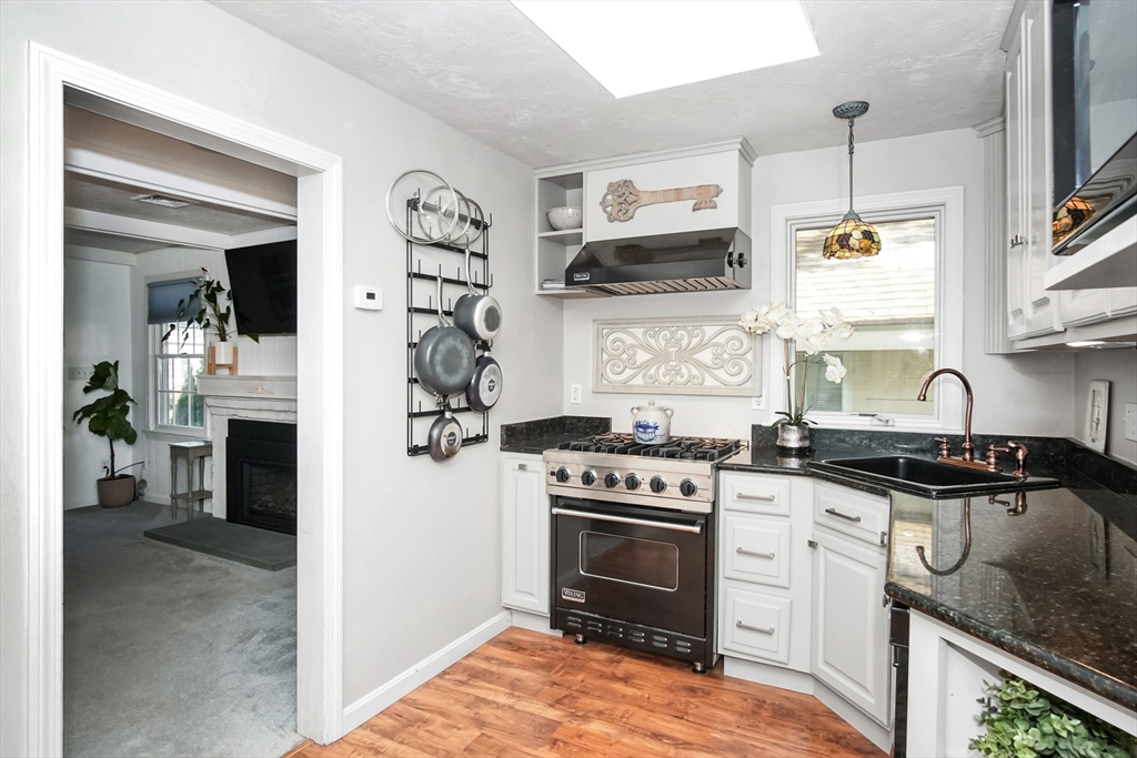 77 Circuit Avenue Wareham, MA 02571 - Photo 9 of 39 a kitchen with stainless steel appliances granite countertop a stove and a sink