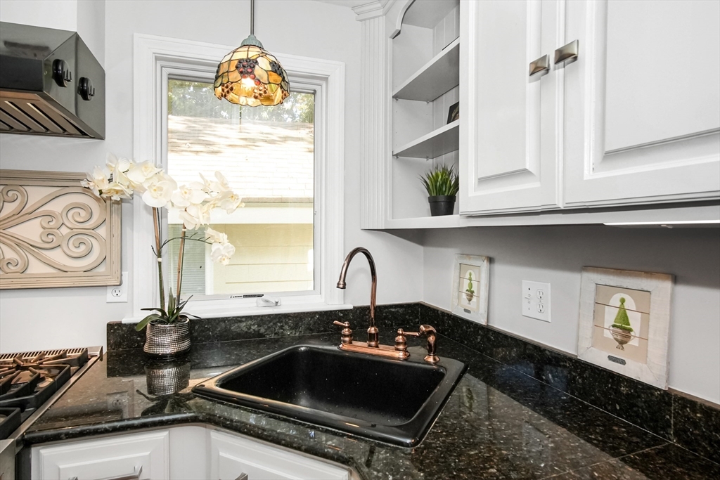 77 Circuit Avenue Wareham, MA 02571 - Photo 10 of 39 a kitchen with a sink and a stove