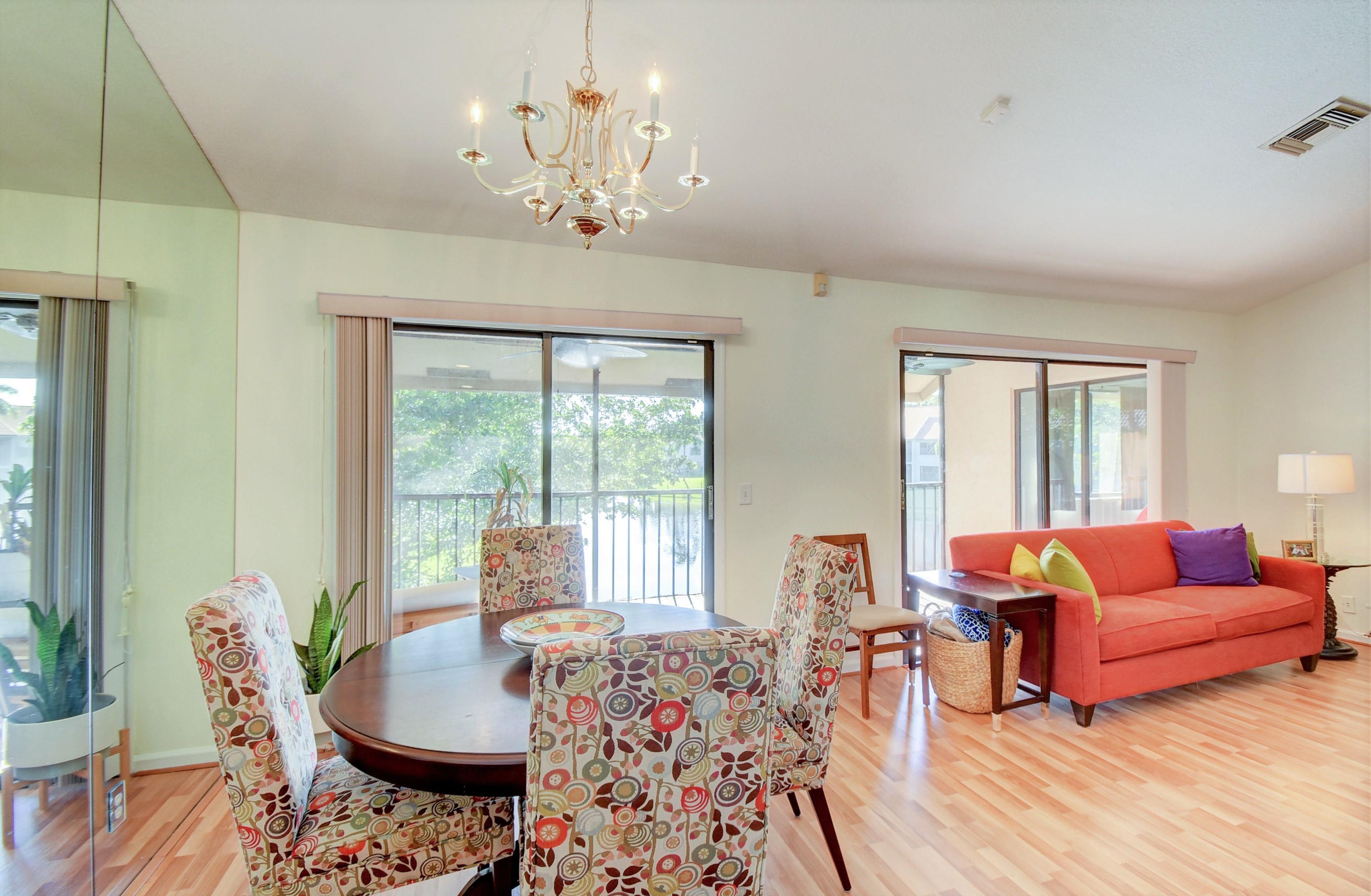 5521 Coach House Circle, Unit F Boca Raton, FL 33486 - Photo 9 of 19 Dining & Living Area
