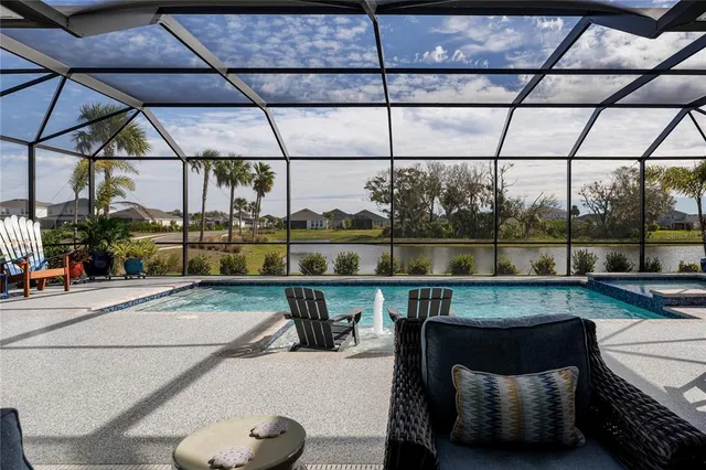a kitchen with stainless steel appliances white cabinets and a stove a refrigerator with wooden cabinets
