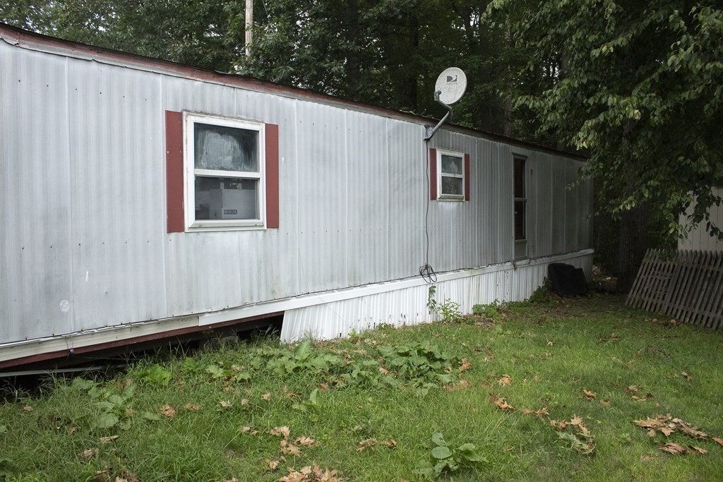 14 Chesapeake Road Holbrook, MA 02343 - Photo 4 of 23 a backyard of a house with lots of green space