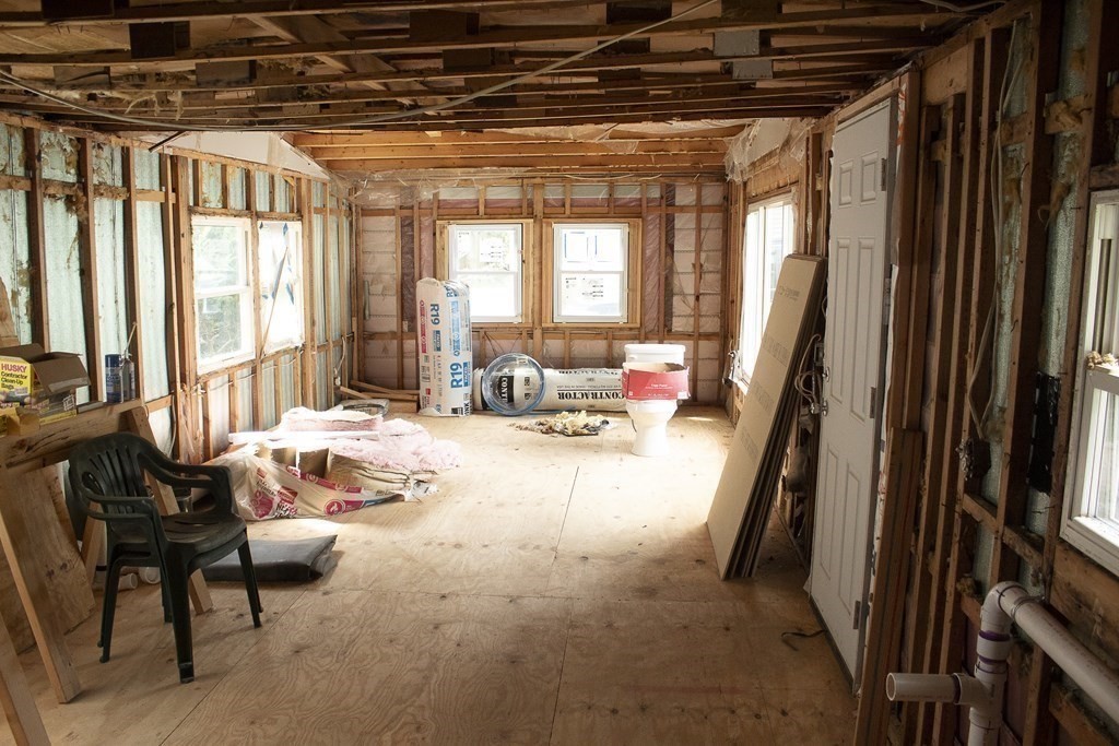14 Chesapeake Road Holbrook, MA 02343 - Photo 9 of 23 a view of a livingroom with furniture and floor to ceiling window